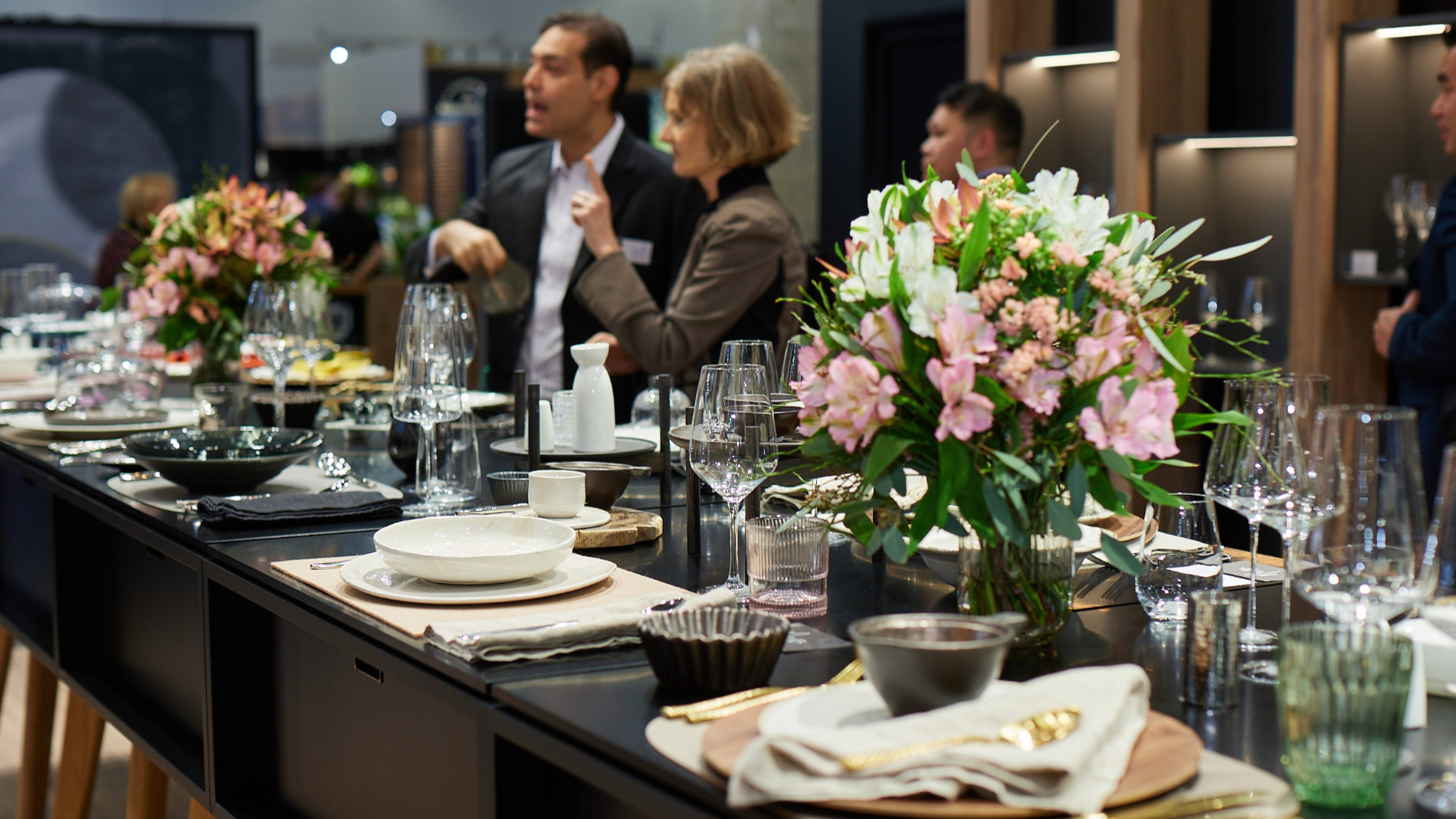 Table set with tableware and flowers at the Ambiente